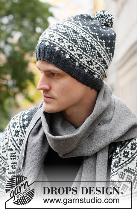 Winter's Night Enchantment Hat / DROPS 219-14 - Knitted hat for men in DROPS Karisma. The piece is worked in the round with Nordic pattern.