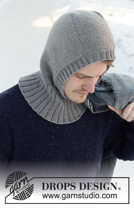Uncharted Territory / DROPS 219-22 - Knitted hat / balaclava for men in DROPS Merino Extra Fine. The piece is worked top down with stockinette stitch and ribbed edging.