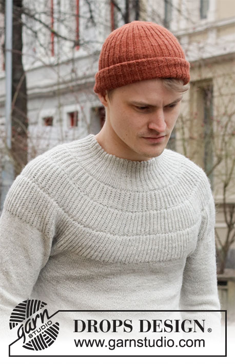 City Glow / DROPS 219-7 - Knitted sweater with round yoke for men in DROPS Alpaca. Piece is knitted top down with English rib on yoke. Size: S - XXXL