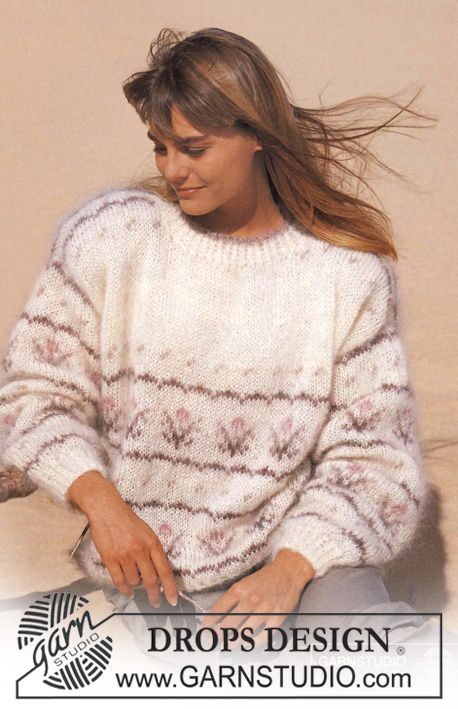 DROPS 22-10 - Knitted jumper with pattern borders in DROPS Vienna or Melody.
