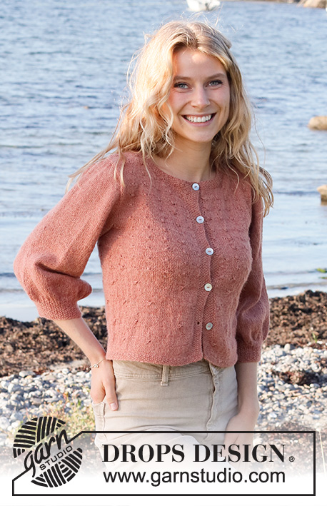 Copper Harbor / DROPS 221-38 - Knitted jacket in DROPS Alpaca. The piece is worked with knotted pattern and ¾-length, balloon sleeves. Sizes S - XXXL.