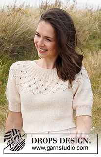 Swing by Spring Top / DROPS 222-32 - Knitted sweater in DROPS Belle. Piece is knitted top down with round yoke, lace pattern, leaf pattern and short balloon sleeves. Size: S - XXXL