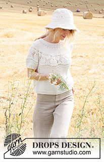 White Moon Top / DROPS 223-13 - Knitted jumper with short sleeves in DROPS Cotton Merino or DROPS Merino Extra Fine. Piece is knitted in stocking stitch with round yoke, lace pattern on yoke and edges in rib. Size XS–XXL.