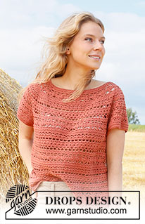 Red River Cave / DROPS 223-28 - Crocheted top in DROPS Safran. Piece is crocheted top down with round yoke and lace pattern. Size XS–XXL.