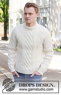 Ice Island / DROPS 224-10 - Knitted jumper for men in DROPS Karisma. The piece is worked with raglan, cables and double neck. Sizes S - XXXL.