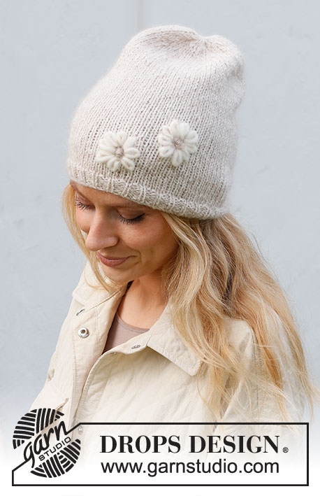 Just Daisy / DROPS 225-3 - Knitted hat in DROPS Sky and DROPS Kid-Silk. Piece is knitted with embroidered flowers.