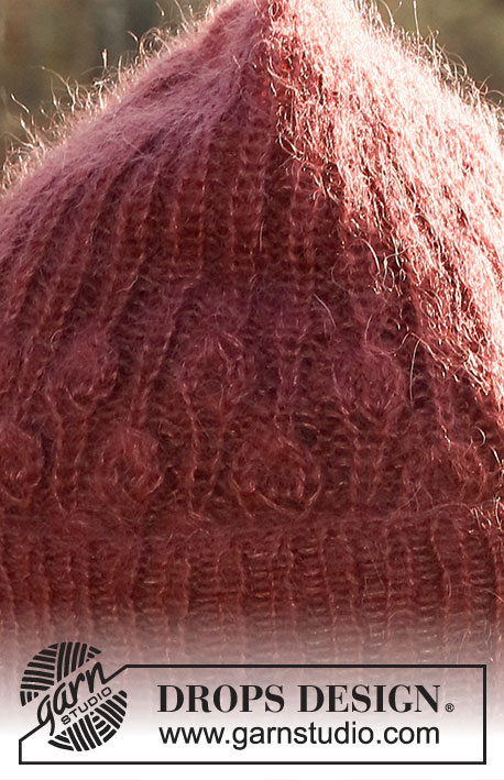 Cranberry Charmer / DROPS 226-48 - Knitted hat in 2 strands DROPS Kid-Silk or 1 strand DROPS Brushed Alpaca Silk. Piece is knitted bottom up with rib and leaf pattern.