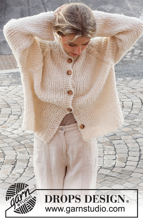 Snow Patches / DROPS 227-21 - Knitted jacket in 2 strands DROPS Alpaca Bouclé. The piece is worked top down with raglan, cables and vents in the sides. Sizes S - XXXL