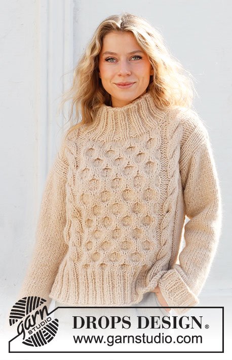 Winter Hive / DROPS 227-27 - Knitted sweater in DROPS Wish. The piece is worked with cables, honeycomb pattern and high neck. Sizes S - XXXL.