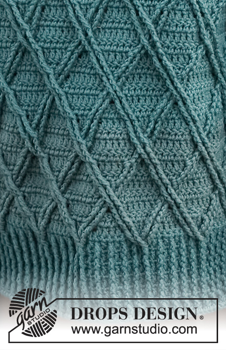 Teal Crossover Sweater / DROPS 227-29 - Crocheted jumper in DROPS Merino Extra Fine. The piece is worked with cables, relief-stitches and double neck. Sizes S - XXXL.