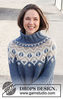 North Gate Sweater / DROPS 228-14 - Knitted jumper in DROPS Wish. Piece is knitted top down with round yoke, multi-coloured pattern and high collar. Size: S - XXXL