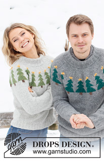 Merry Trees / DROPS 228-47 - Knitted Christmas jumper in DROPS Air. Piece is knitted top down, with round yoke and Christmas tree pattern. Size XS – XXL. Theme: Christmas.