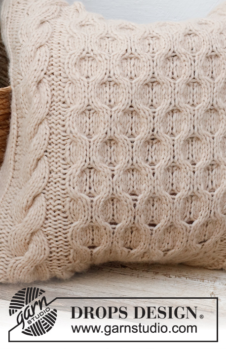 Winter Hive Pillow / DROPS 228-59 - Knitted cushion-cover with cables and honeycomb pattern in DROPS Wish.