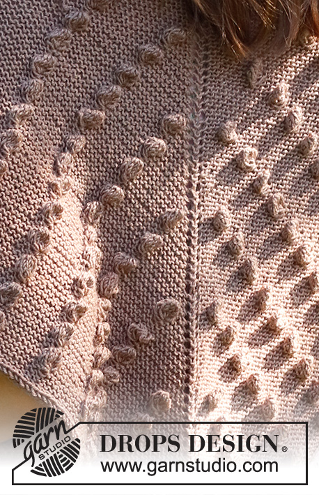 Miss Austen / DROPS 229-13 - Knitted shawl in DROPS BabyMerino. The piece is worked top down with garter stitch and bobbles.