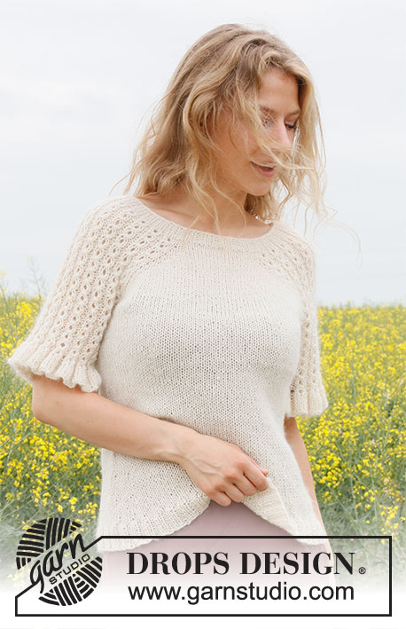 Pearlescent Top / DROPS 230-25 - Knitted jumper in DROPS Alpaca and DROPS Kid-Silk. The piece is worked top down, with cables and flounces on the sleeves. Sizes S - XXXL.