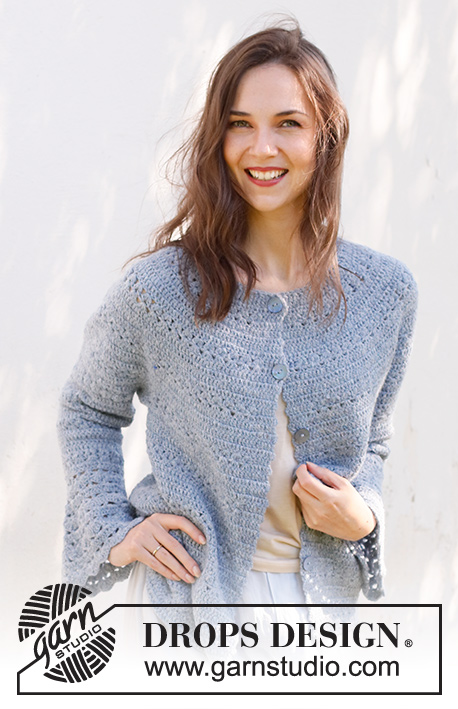 Spring Renaissance Cardigan / DROPS 230-38 - Crocheted jacket in DROPS Sky. The piece is worked top down with round yoke, lace and fan pattern and trumpet sleeves. Sizes S - XXXL.