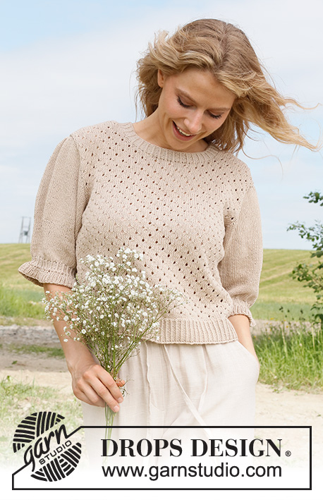 Charm Valley Top / DROPS 232-32 - Knitted jumper with short sleeves / t-shirt in DROPS Safran. Piece is knitted bottom up with lace pattern and short puffed sleeves. Size: S - XXXL