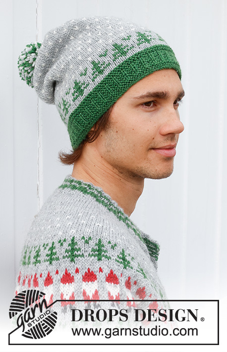 Christmas Time Hat / DROPS 233-14 - Knitted hat for men in DROPS Karisma. The piece is worked bottom up, with coloured pattern of Christmas tree. Theme: Christmas.