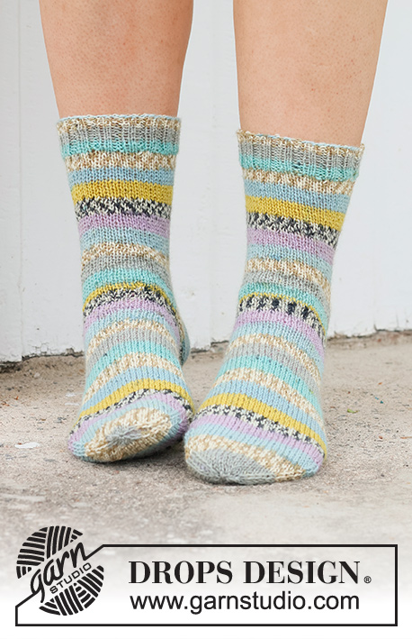 Country Charmers / DROPS 234-66 - Knitted socks in DROPS Fabel. The piece is worked top down in stocking stitch. Sizes 35 - 43.