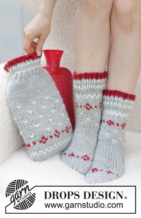Christmas Sparkle Socks / DROPS 234-75 - Skarpetki na drutach przerabiane od góry do dołu, dżersejem i z żakardem norweskim, z włóczki DROPS Snow. Od 35 do 43. Temat: Boże Narodzenie.