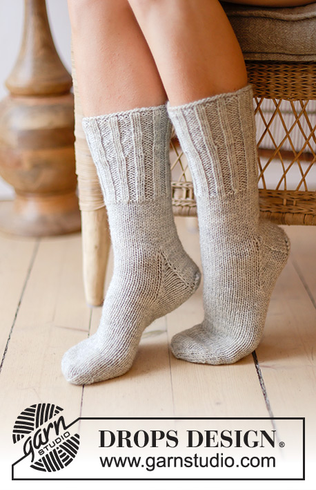 Comfy Camper / DROPS 238-32 - Knitted socks in 2 strands DROPS Nord. The piece is worked top down with rib and stockinette stitch. Sizes 35 – 43 = US 4 1/2  - 12 1/2.