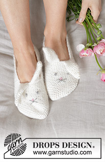 Bunny Ears Slippers / DROPS 238-39 - Crocheted bunny slippers for children and women in 2 strands DROPS Fabel and 1 strand DROPS Kid-Silk. The piece is worked from heel to toe, with crocheted ears and embroidered eyes and nose. Sizes 24 - 43. Theme: Easter.