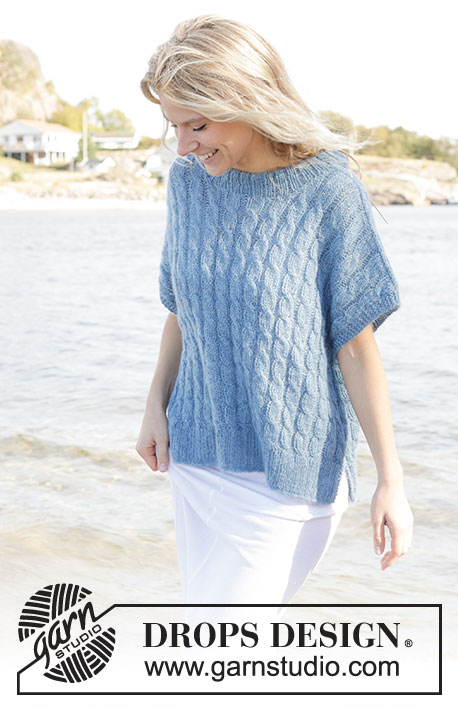 Swirling Sea / DROPS 239-14 - Knitted oversized vest in DROPS Flora and DROPS Kid-Silk. Piece is knitted bottom up with cables, double neck edge and vent in the side. Size XS – XXL.
