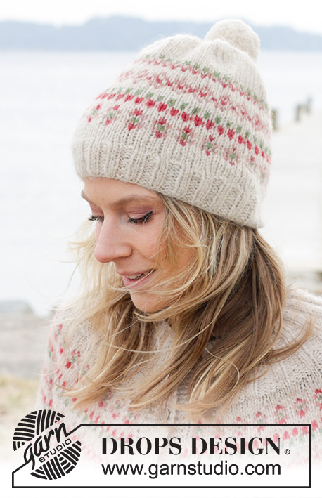 Something About Holly Hat / DROPS 242-20 - Knitted hat in DROPS Air. The piece is worked with multi-colored pattern.