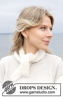 Mimie Shawl / DROPS 242-56 - Šátek pletený kolmo, napříč perličkovým vzorem z příze DROPS Melody.