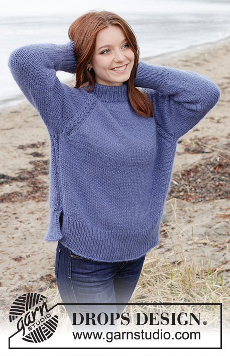 Moonlit Ocean / DROPS 245-13 - Knitted jumper in DROPS Merino Extra Fine and DROPS Kid-Silk. The piece is worked top down with double neck, raglan, cables and split in sides. Sizes S - XXXL.
