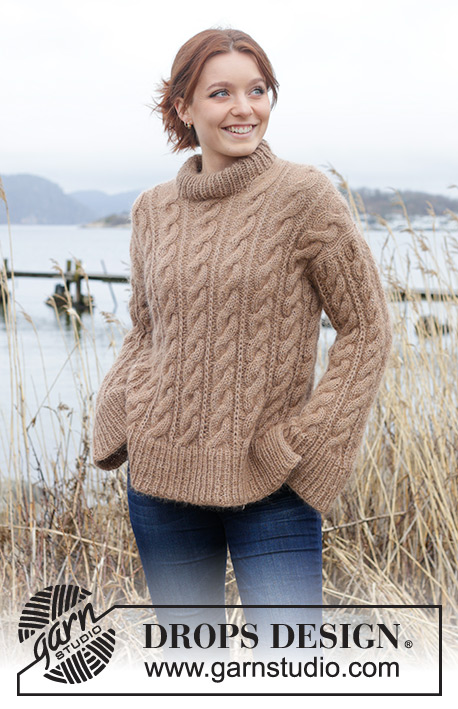 Cinnamon Swirls / DROPS 245-20 - Knitted jumper in DROPS Puna and DROPS Kid-Silk. The piece is worked top down with European/diagonal shoulders, cables, double neck and split in sides. Sizes S - XXXL.