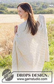 Spring Slalom / DROPS 247-1 - Knitted blanket in DROPS Lima or DROPS Daisy. The piece is worked back and forth, in squares with lace pattern.