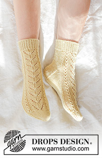 Bright Morning Socks / DROPS 247-20 - Knitted socks in DROPS Nord. Piece is knitted with lace pattern. Size 35-43.