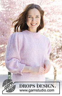 Summer Sonnet / DROPS 250-22 - Knitted sweater in DROPS Air. The piece is worked bottom up, with double neck and sewn-in puffed balloon-sleeves. Sizes S - XXXL.