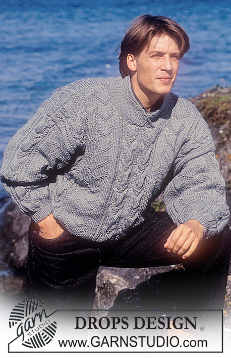 Cabled Motion / DROPS 28-22 - Męski sweter na drutach, z warkoczami, z włóczki DROPS Alaska