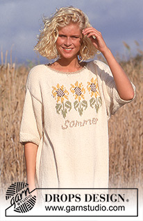 Sunflower Dance / DROPS 33-5 - Lange DROPS trui met korte mouwen en zonnebloemen van “Paris”. Maat S - L. 