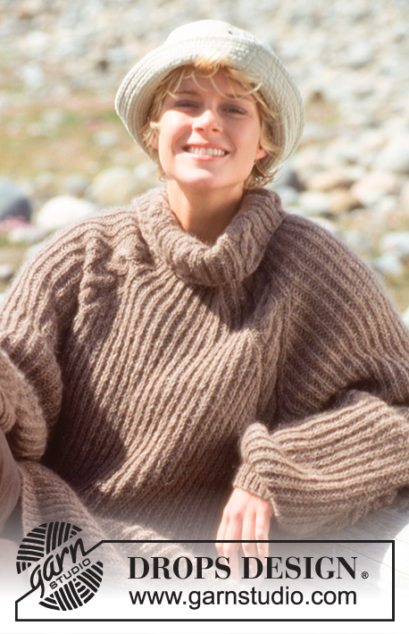 The Big Cozy / DROPS 40-11 - DROPS jumper with cables and false English rib in “Alpaca” and Kid Silk. Long or short version. Size S – L.