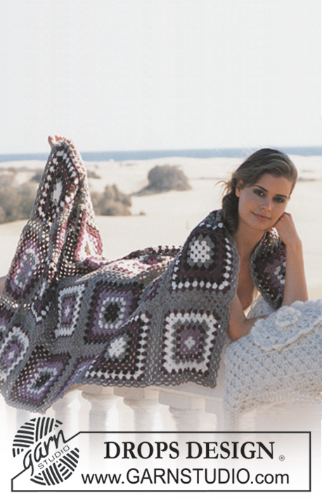 DROPS 87-20 - Crochet DROPS blanket in Karisma Superwash and crochet cushion with flower in Karisma Superwash and Vivaldi