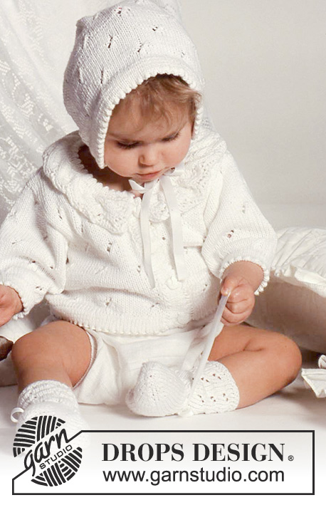 Sweet Smile / DROPS Baby 1-8 - DROPS vestje in kantpatroon met kanten kraag, mutsje en sokken van “Safran”.