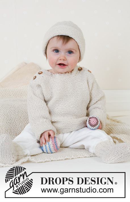 Sweet Ella / DROPS Baby 14-13 - Retstrikket bluse med knapper og sokker til baby og børn i DROPS Alpaca. Størrelse 1 måned til 4 år.
(Hue og Tæppe: se opskrift under model nr 12-14)
