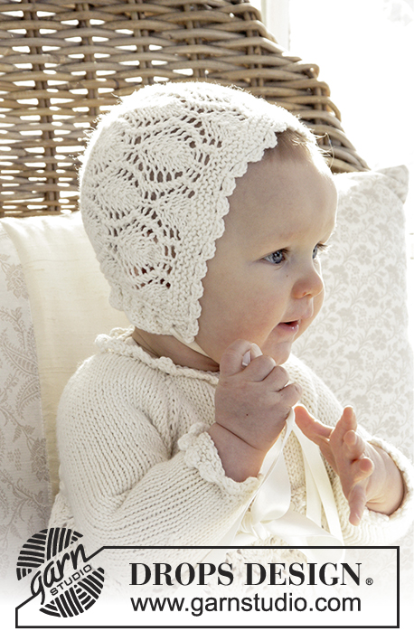 My Fairy / DROPS Baby 29-1 - This set is made up of: Dress for Christening or special occasions worked top down with raglan and lace pattern in DROPS Cotton Merino. Knitted hat with lace pattern in DROPS Cotton Merino. Baby sizes 0 - 2 years.