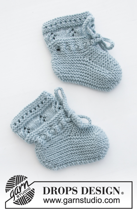 Odeta Pants / DROPS Baby 31-4 - The set consists of: knitted baby shorts and slippers with lace pattern and garter stitch. Sizes premature  - 4 years. The set is worked in DROPS BabyMerino.