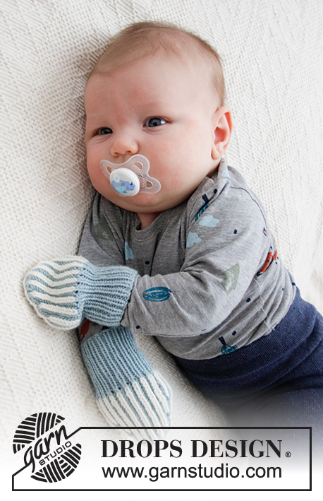 Tiny Mitts / DROPS Baby 36-10 - Vauvan neulotut käsineet DROPS BabyMerino -langasta. Työssä on 2-värinen täyspatenttineule. Koot 1 kuukausi - 9 kuukautta.