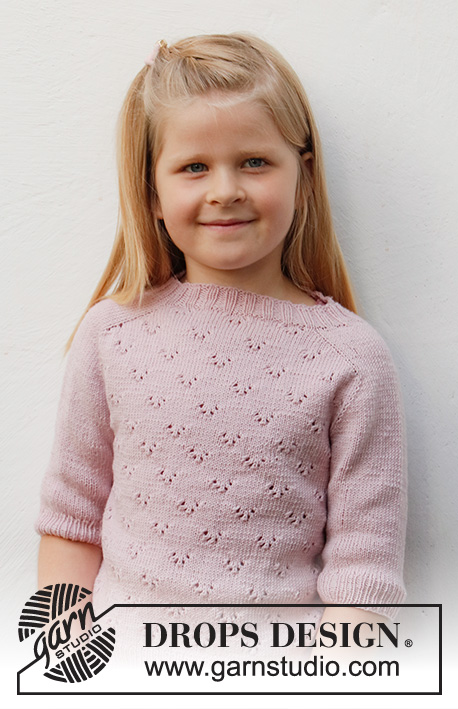 Pink Peony / DROPS Baby & Children 38-21 - Knitted sweater for children in DROPS Baby Merino. The piece is worked top down with saddle-shoulders, lace pattern and short sleeves. Sizes 3-14 years.