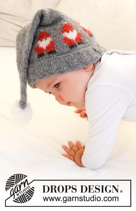 Merry Santas Hat / DROPS Baby 42-22 - Stickad mössa till baby i DROPS Air. Arbetet stickas med tomtar och garnboll.
Storlek 0 - 2 år. Tema: Jul. 
