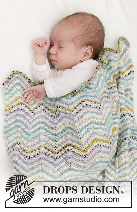 Seaside Seashells Blanket / DROPS Baby 46-10 - Gestrickte Decke für Babys in DROPS Fabel. Die Arbeit wird mit Zickzackmuster gestrickt.