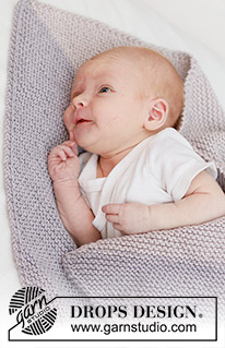 Nap Companion Blanket / DROPS Baby 46-16 - Strikket teppe til baby i DROPS Big Merino. Arbeidet strikkes i riller fra hjørne til hjørne. Tema: Babyteppe