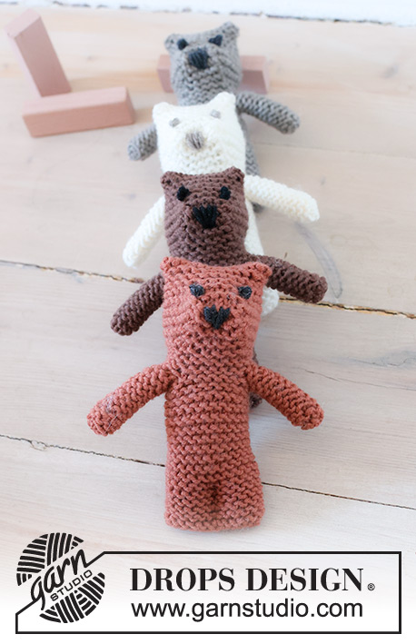Tiny Bear / DROPS Baby 46-17 - Zabawka dziecięca miś na drutach, z włóczki DROPS Merino Extra Fine. Przerabiana od góry do dołu, ściegiem francuskim, z wyszywanym noskiem i oczkami. Temat: zabawki.