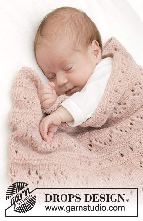 Pink Sea Blanket / DROPS Baby 46-9 - Neulottu vauvanpeitto DROPS Sky-langasta. Työssä on pitsineuletta ja ainaoikeinneuletta.