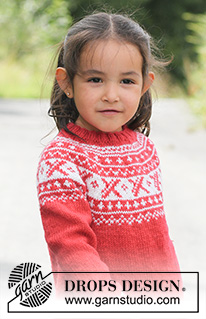 Selina / DROPS Children 22-20 - Tunique DROPS tricotée de haut en bas en ”Karisma” avec empiècement arrondi et jacquard norvégien. 
Du 3 au 12 ans.